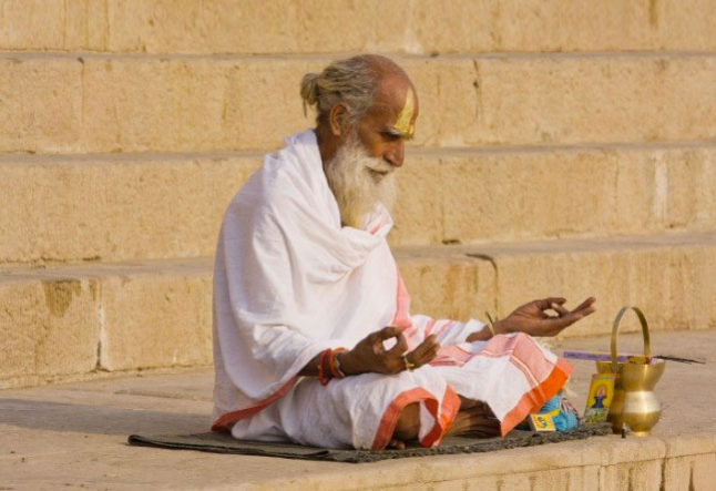 indian yogi sitting and praying sattvic foods a yogic diet meal yogic food eat like a yogi