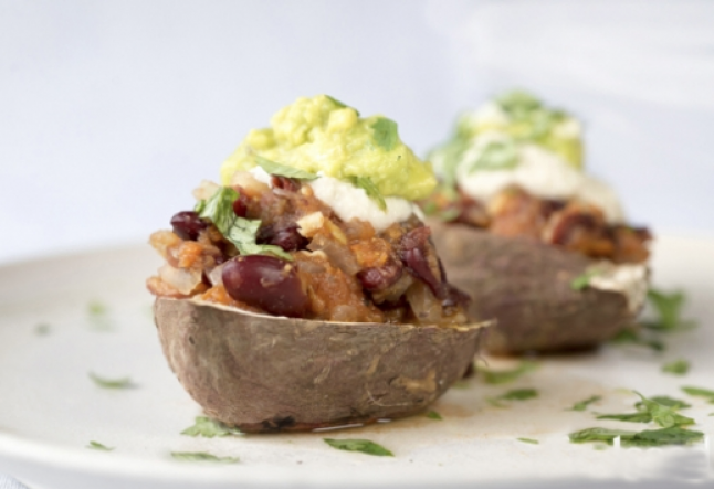 baked sweet potato with chili beans, guacamole & cashew sour cream