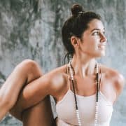 brunette woman in yoga pose trauma stress anxiety