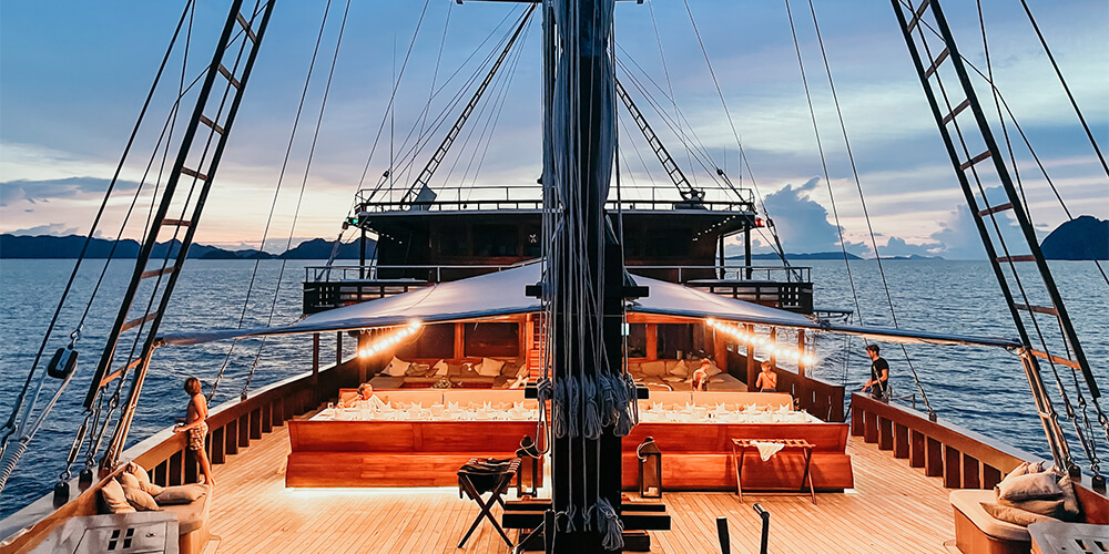 Getting ready for the fancy night dinners on the deck - Photo by YOGI TIMES prana yacht indonesia phinisi