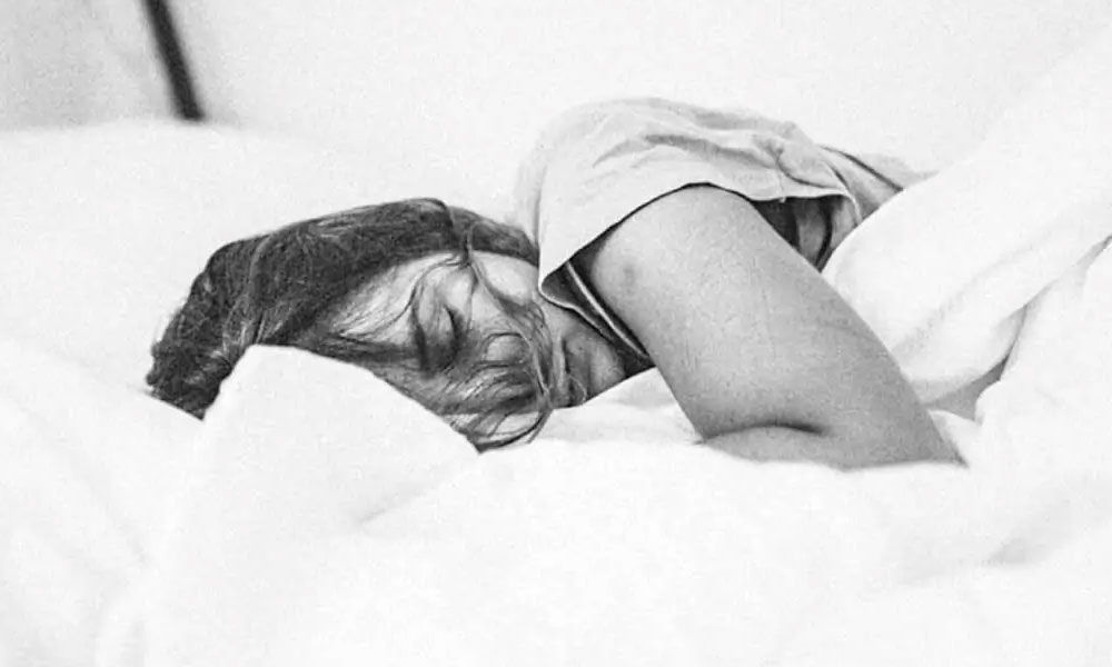 woman sleeping in bed yoga nidra sleep for self heal insomnia